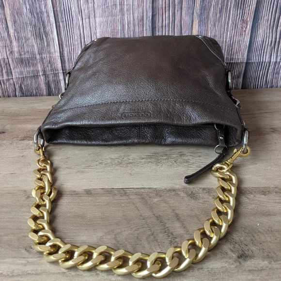 Coach Carly Brown Leather Hobo. It features chocolate brown pebbled leather, - Picture 8 of 11